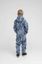 Back view of a child wearing a Softshell Onesie for Kids in a stylish blue design.
