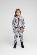 Softshell onesie for kids in vibrant rainbow colors, featuring a weather-resistant kids onesie design.