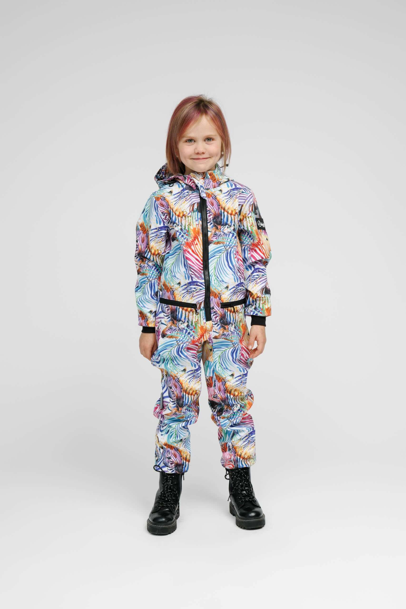 Softshell onesie for kids in vibrant rainbow colors, featuring a weather-resistant kids onesie design.
