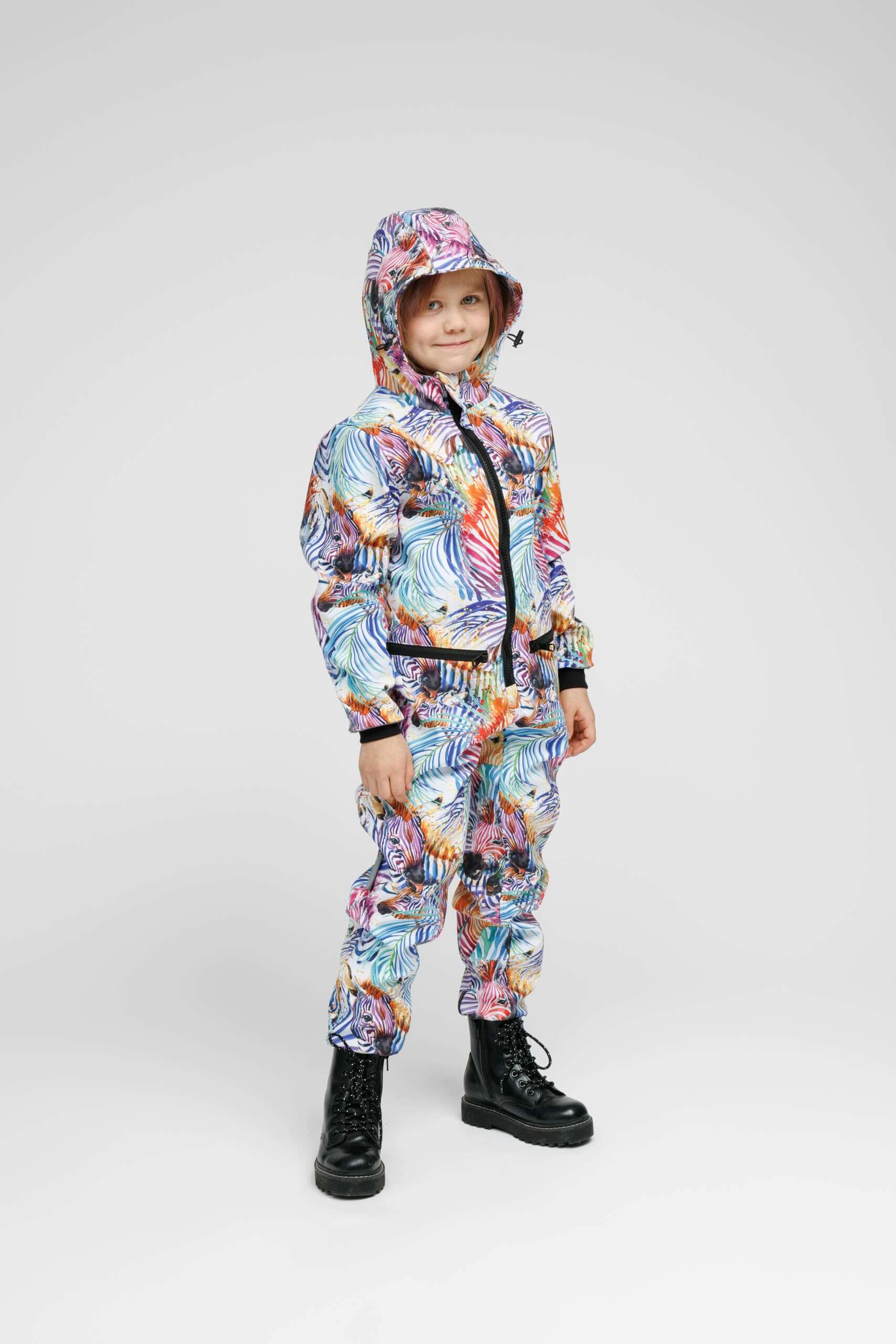 Softshell onesie for kids in rainbow colors, perfect weather-resistant kids onesie for outdoor activities.