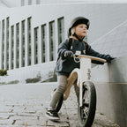 A child riding a leg&go Balance Bike 3in1, showcasing sustainable wooden design and innovative features for growing kids.
