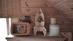 Rocket shelf space decor featuring wooden rocket shelf, charming stars, and playful storage on a rustic wooden background.