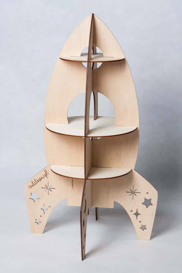 Rocket Shelf - Self-Assembly Wooden Decoration for space decor, featuring charming cut-out stars and durable design.