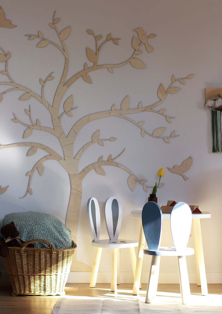 wooden wall decoration tree birds beautifully displayed with a tree and birds on the wall in a cozy room setting.
